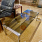 Table basse années 70 verre fumé et métal Chromé